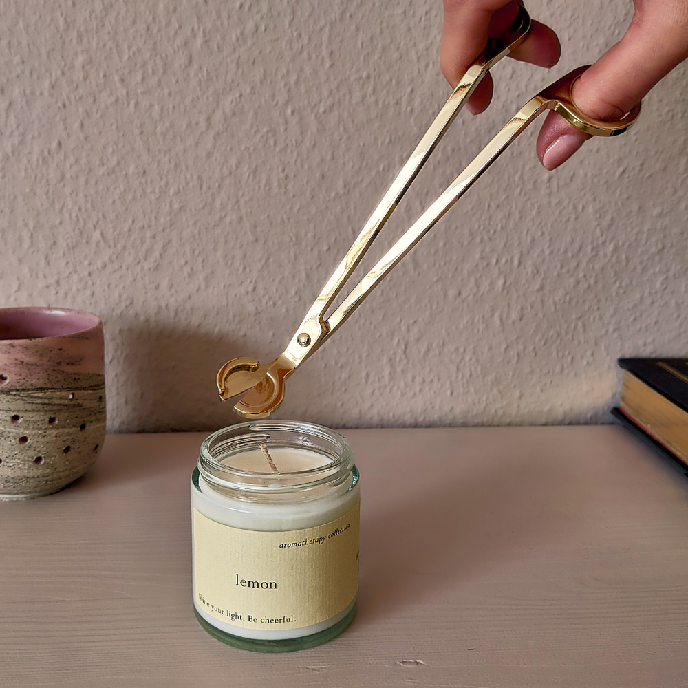 
                  
                    Candle wick trimmer gold
                  
                
